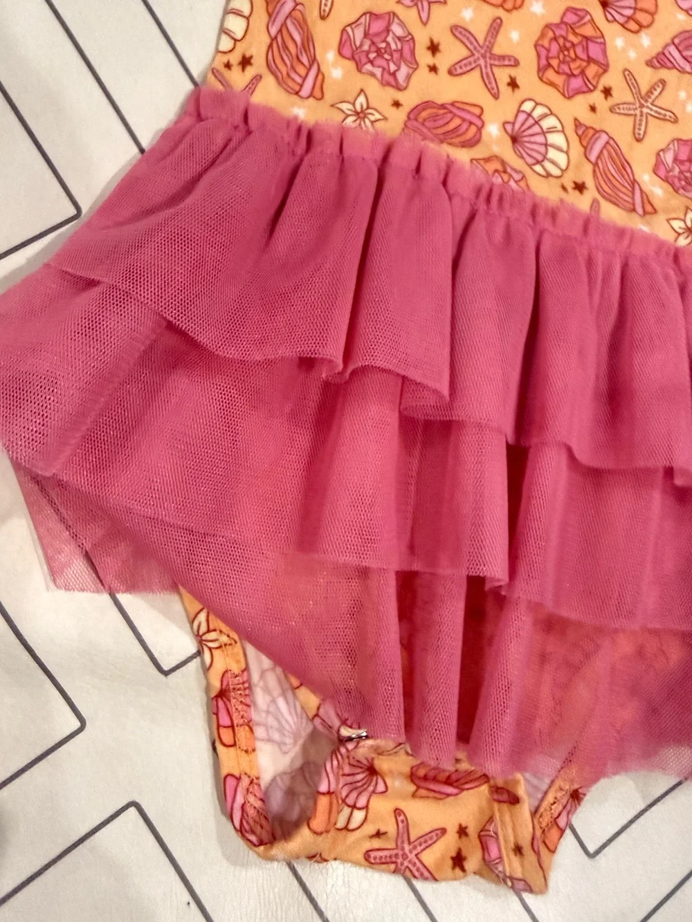 Dream Big Little Sea Shell Print One-Piece with Pink Tulle Skirt